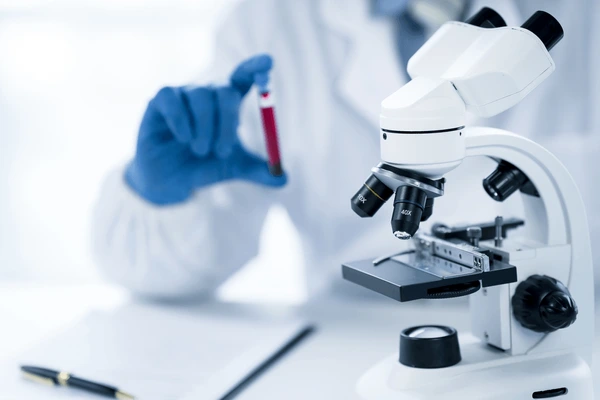 doctor-hand-taking-blood-sample-600nw-2179884263